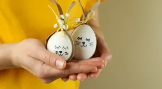woman-hold-easter-bunnies-made-eggs